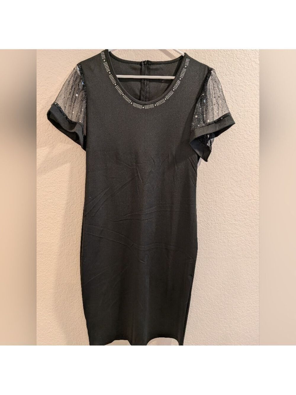 A Little Black Dress With Sequin Short Sleeves And Embellished Neck Line, Medium